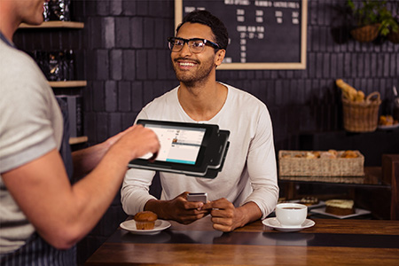 Man paying at a restaurant